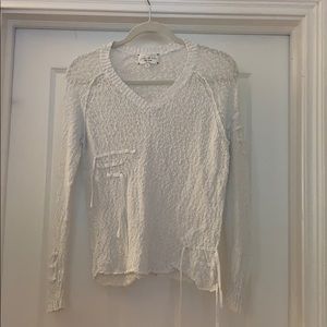 Feel the Piece white sweater with fun details